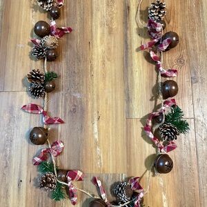 Festive Pinecone and Bell Garland with Red Accents